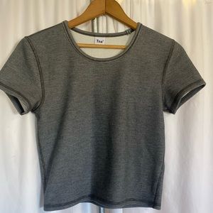 Grey TNA crop top.